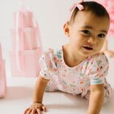 Puffed Rosie Romper in Sugar Plum