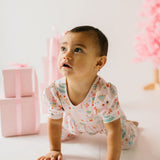 Puffed Rosie Romper in Sugar Plum