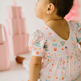 Puffed Rosie Romper in Sugar Plum