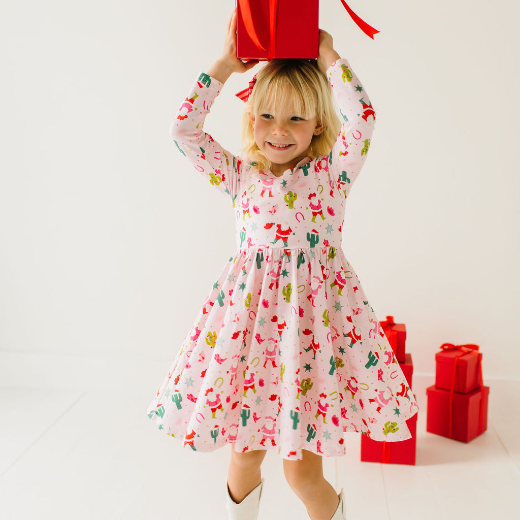 Gwendolyn Dress in Cowboy Santa, Girls' Twirl Dress by Ollie Jay