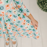 Gwendolyn Dress in Holiday Stamps